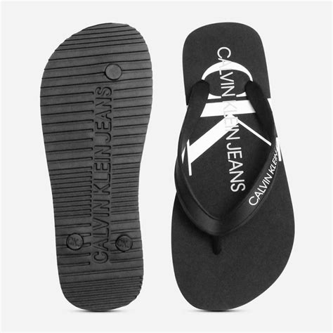 calvin klein flip flops|calvin klein slip on sandals.